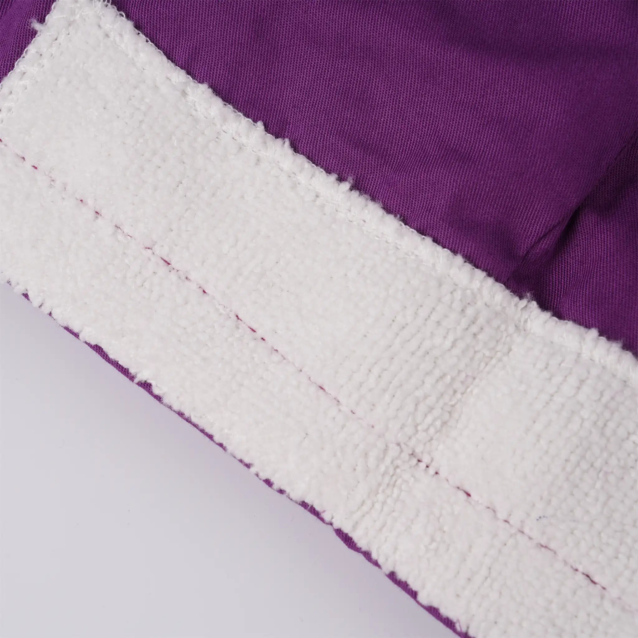 Close-up of the forehead sweatband, showing the texture and stitched seam.