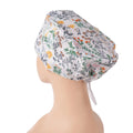 White green botanical print euro scrub cap, side-back view on mannequin