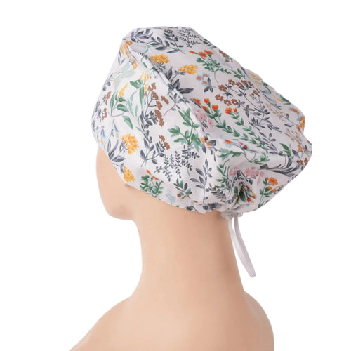White green botanical print euro scrub cap, side-back view on mannequin