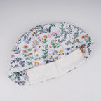 Close-up of forehead sweatband on botanical print euro cap.