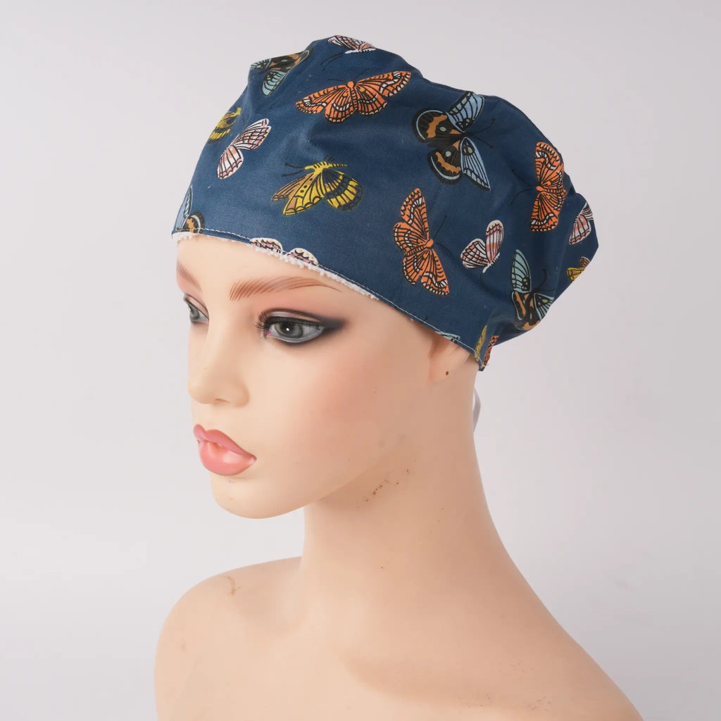 Front view of navy butterfly euro cap on mannequin head