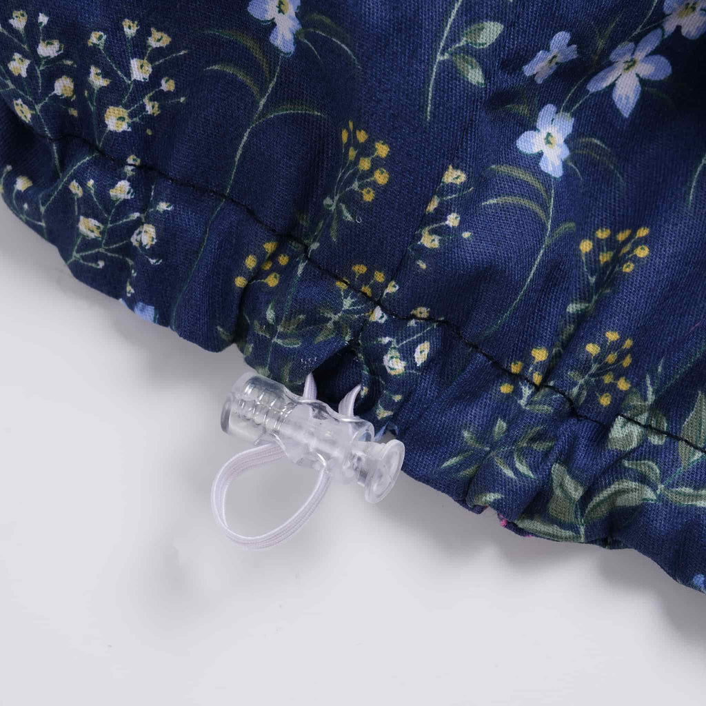 Close-up of a clear plastic elastic cord-lock.