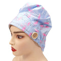 Side view of pink flamingos light blue bouffant scrub cap on model dead