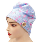 Side view of pink flamingos light blue bouffant scrub cap on model dead