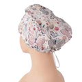 Side back view of euro scrub cap with gray, pink butterflies and flowers