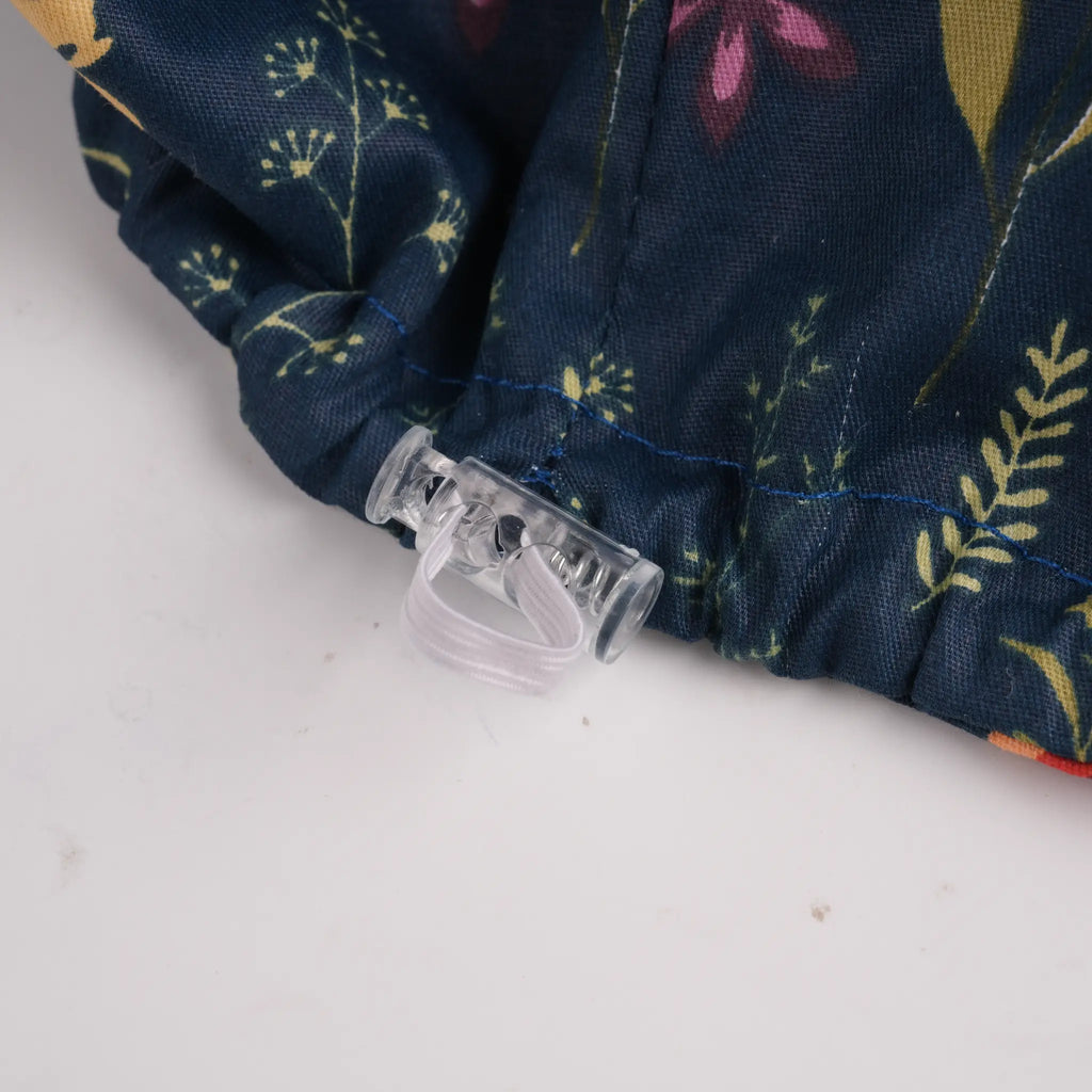 Close-up of clear plastic adjustable toggle.