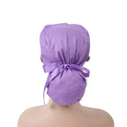Solid purple ponytail scrub cap with ribbon tied in a bow at the back