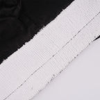 Close-up of sweatband, showing the stitched edge.