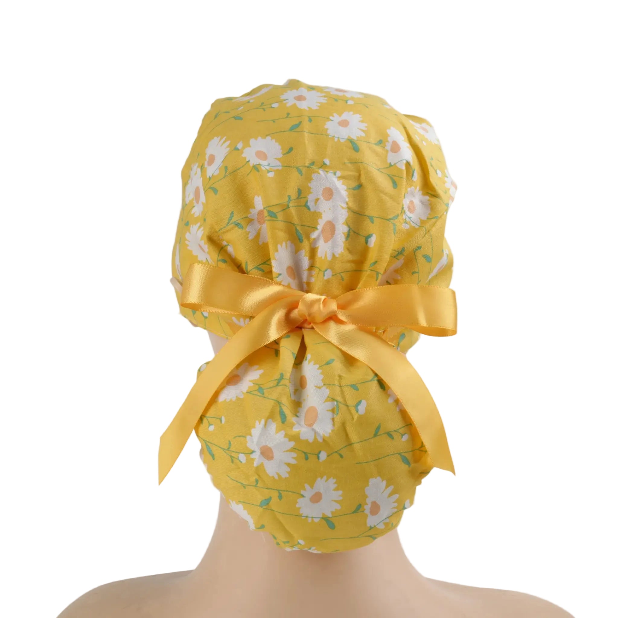 Yellow daisy floral ponytail scrub cap with matching satin ribbon bow, back view on mannequin